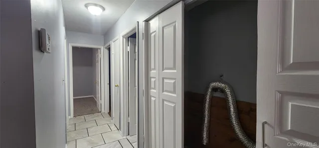 a view of elevator with hallway