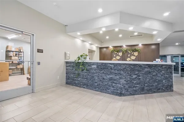 a view of a hallway with entryway