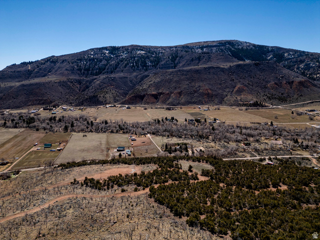 8094 West Red Cloud Loop Road Vernal, UT 84078 - Photo 31 of 35 Mountain view featuring rural landscape directly South