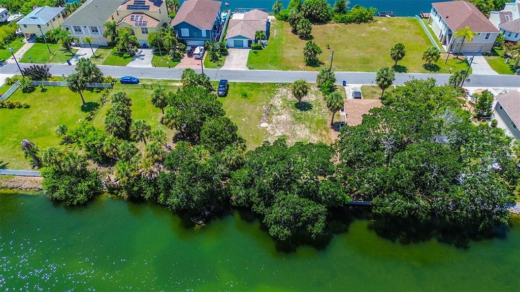 0 Sea Grape Drive, Unit LOT 10 Hernando Beach, FL 34607 - Photo 15 of 23 an aerial view of residential house with outdoor space and swimming pool
