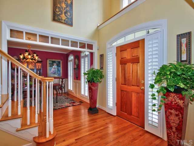 9437 Macon Road Raleigh, NC 27613 - Photo 3 of 25 Welcoming two story foyer with ample natural light and hardwood floors. Foyer
