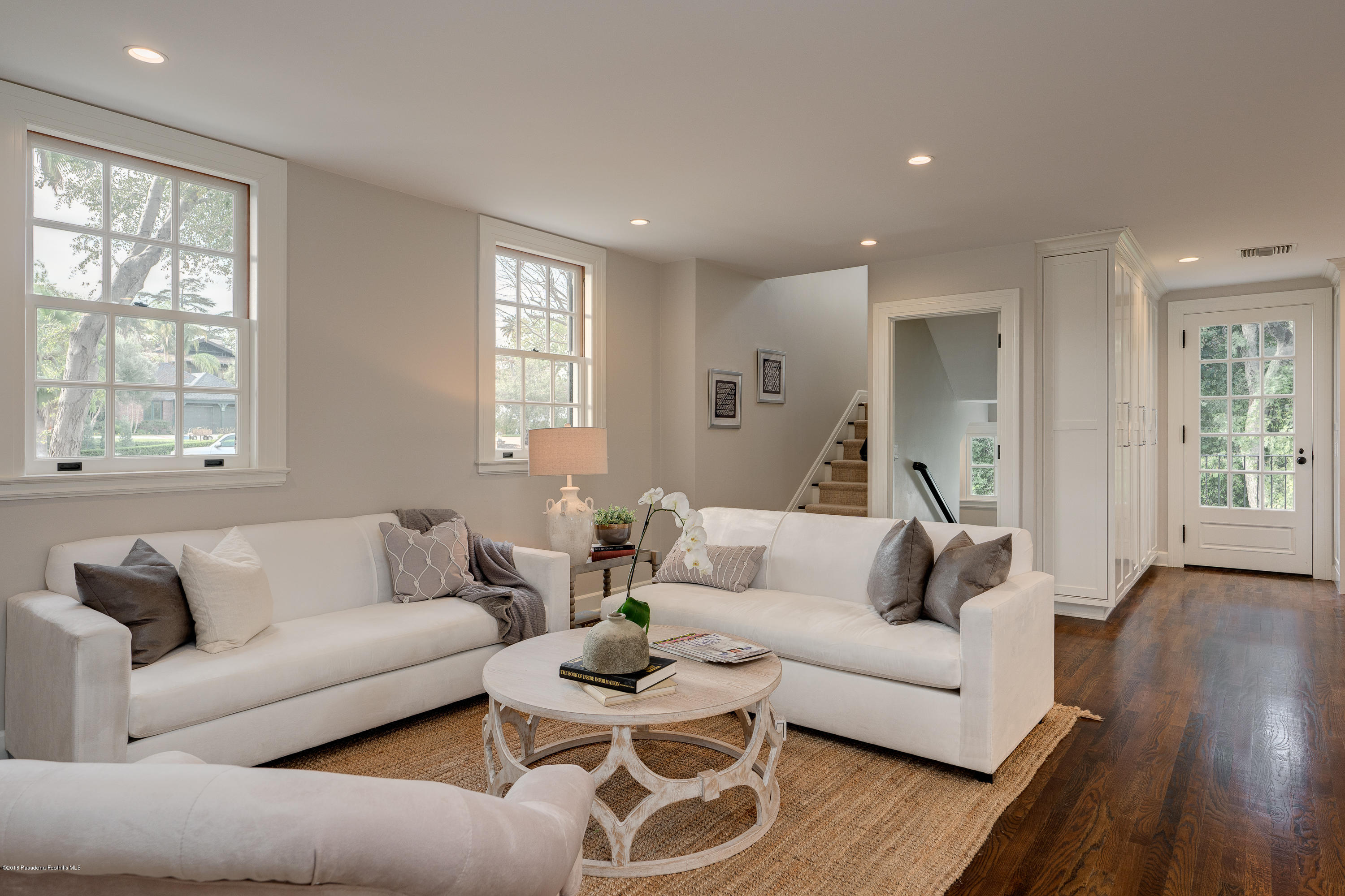 1234 Hillcrest Avenue Pasadena, CA 91106 - Photo 23 of 82 a living room with furniture and wooden floor