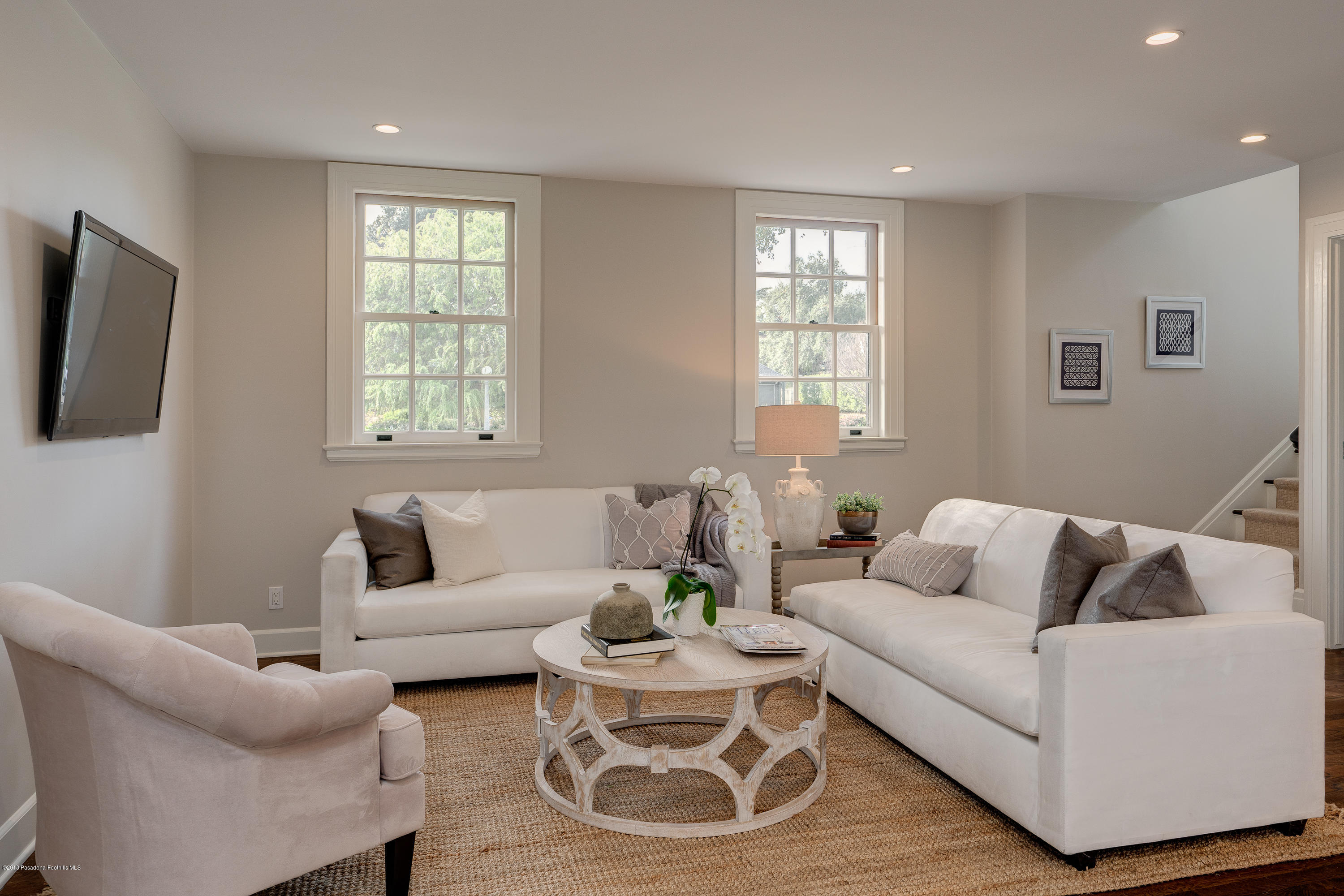 1234 Hillcrest Avenue Pasadena, CA 91106 - Photo 24 of 82 a living room with furniture and a flat screen tv