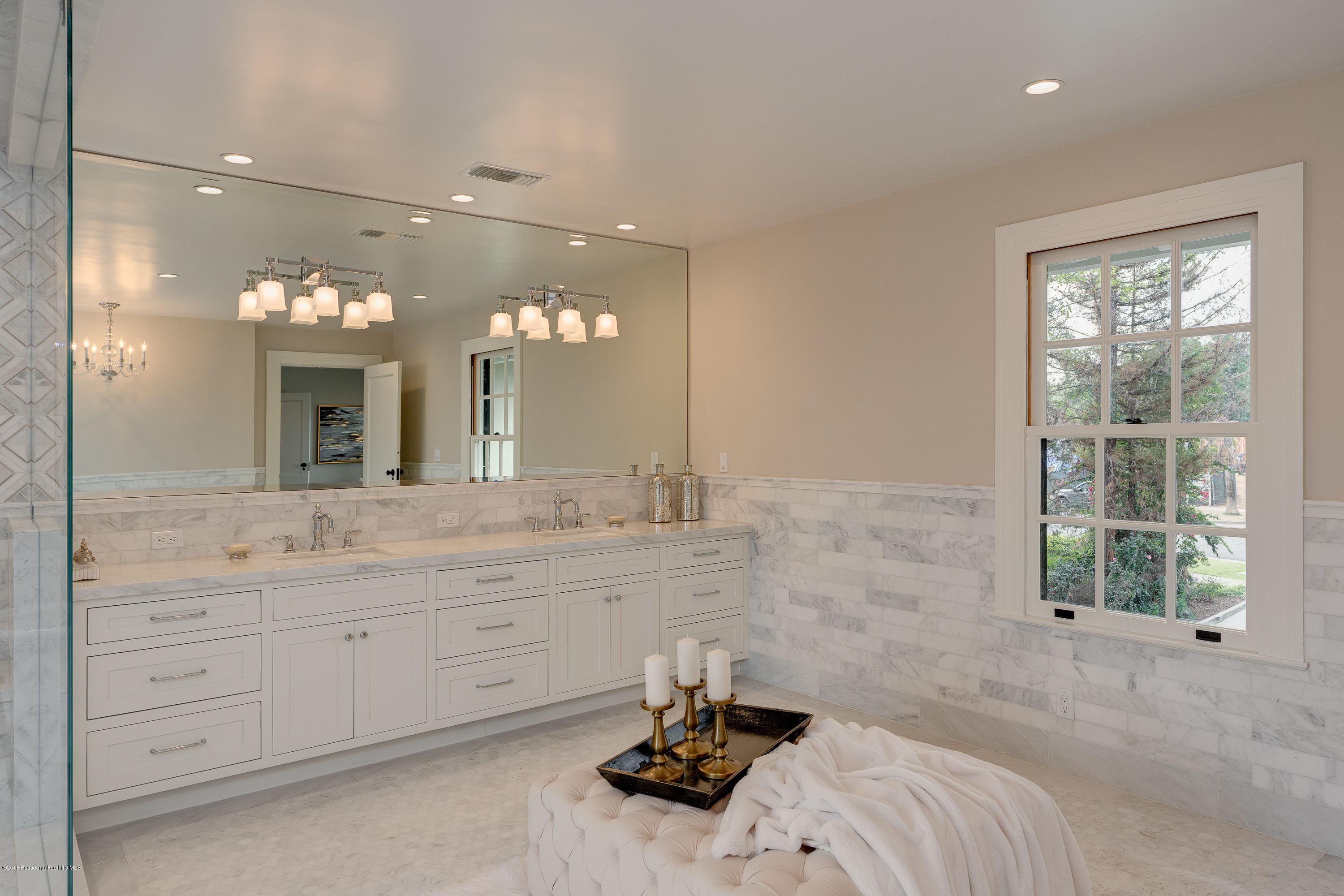 1234 Hillcrest Avenue Pasadena, CA 91106 - Photo 35 of 82 a bathroom with a sink and a mirror