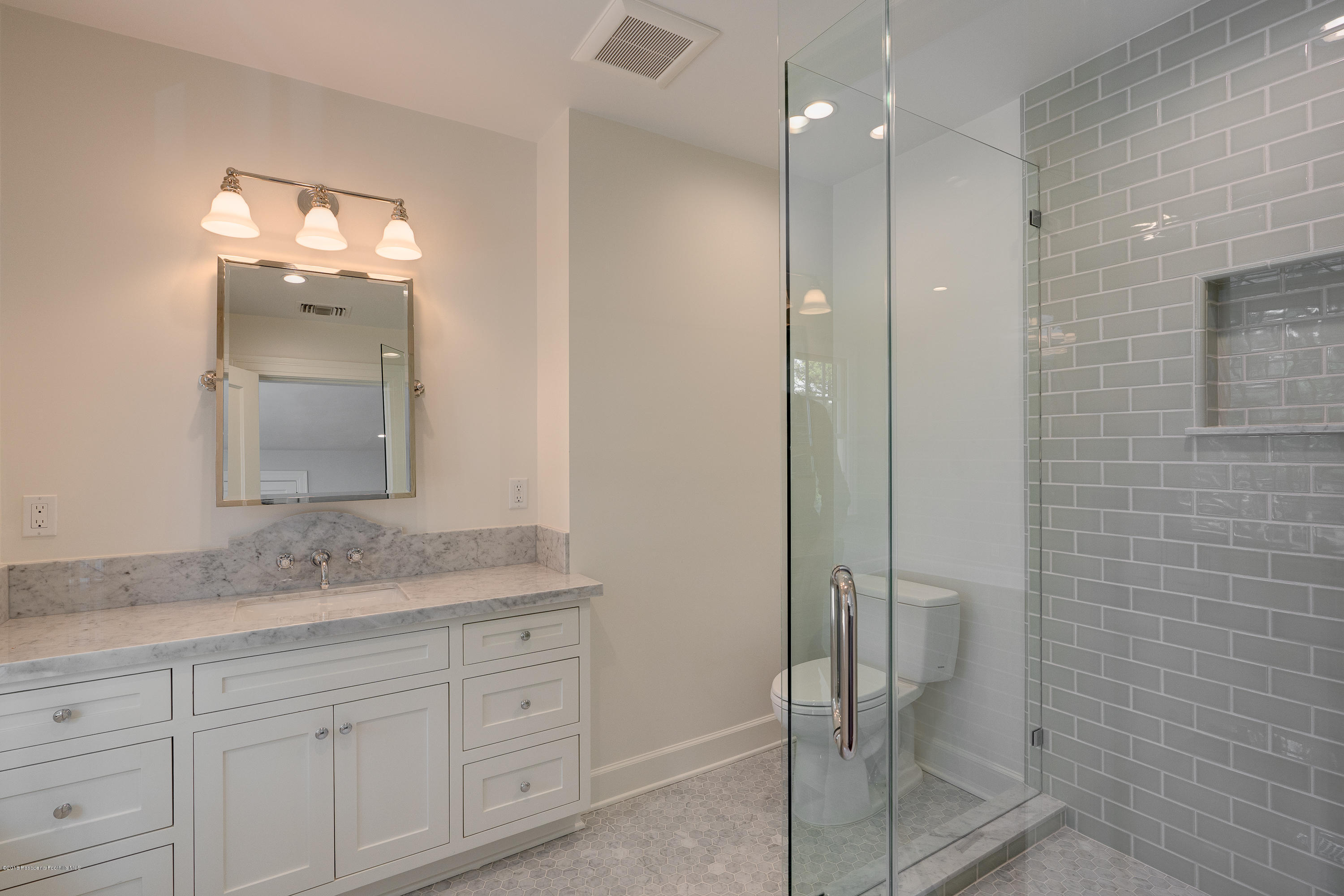 1234 Hillcrest Avenue Pasadena, CA 91106 - Photo 39 of 82 a bathroom with a granite countertop sink mirror and shower