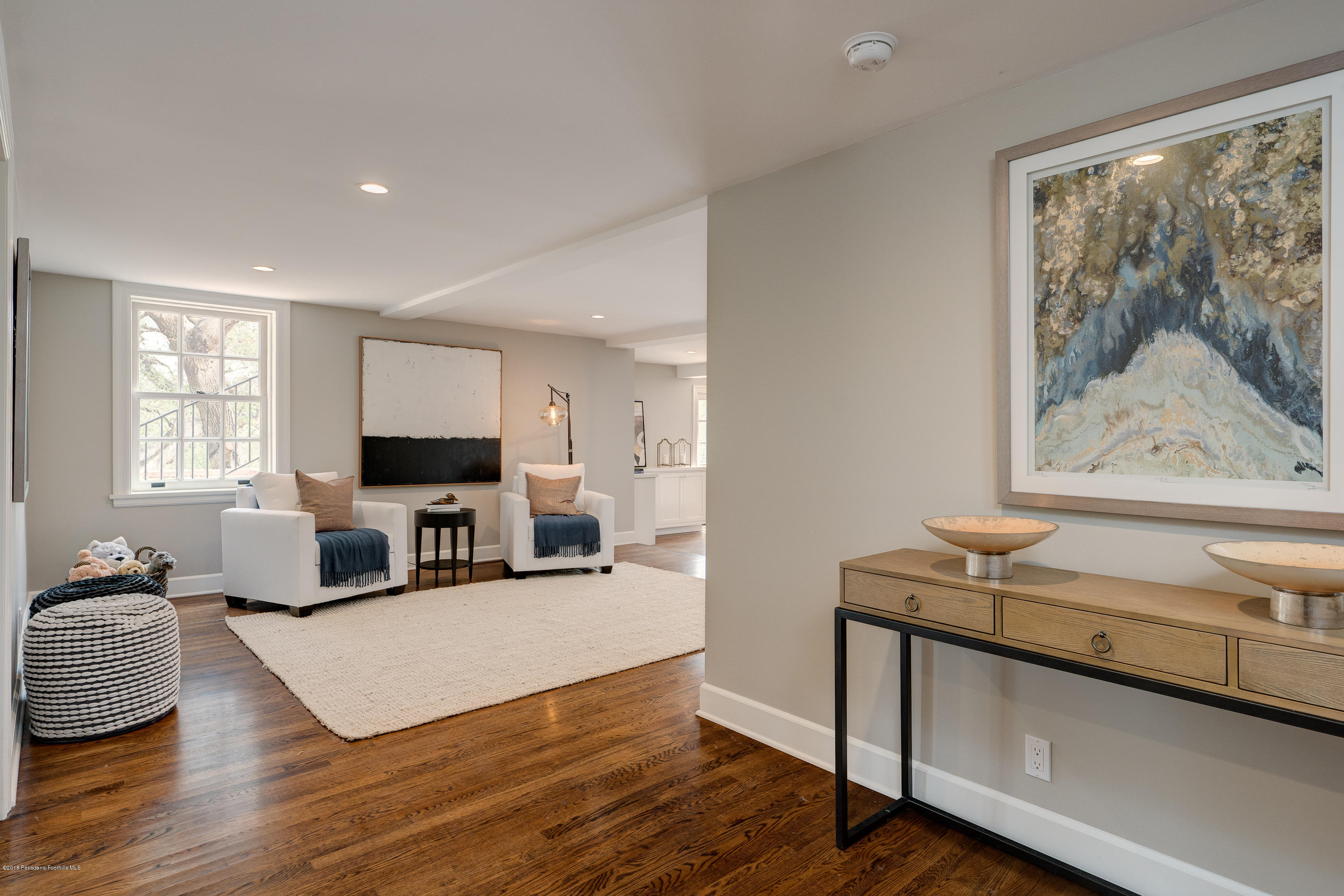 1234 Hillcrest Avenue Pasadena, CA 91106 - Photo 47 of 82 a living room with granite countertop furniture and a flat screen tv