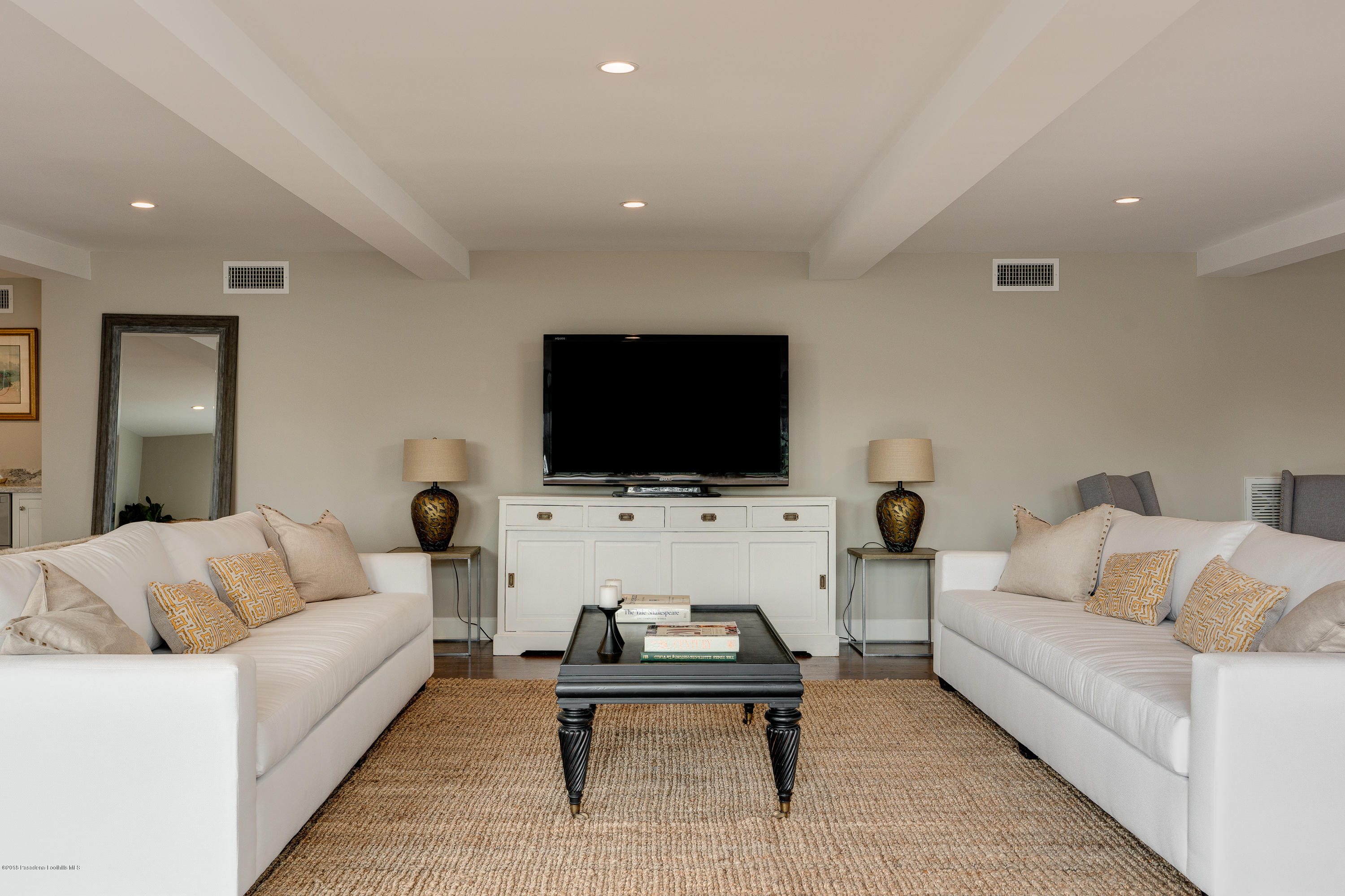 1234 Hillcrest Avenue Pasadena, CA 91106 - Photo 51 of 82 a living room with furniture and a flat screen tv