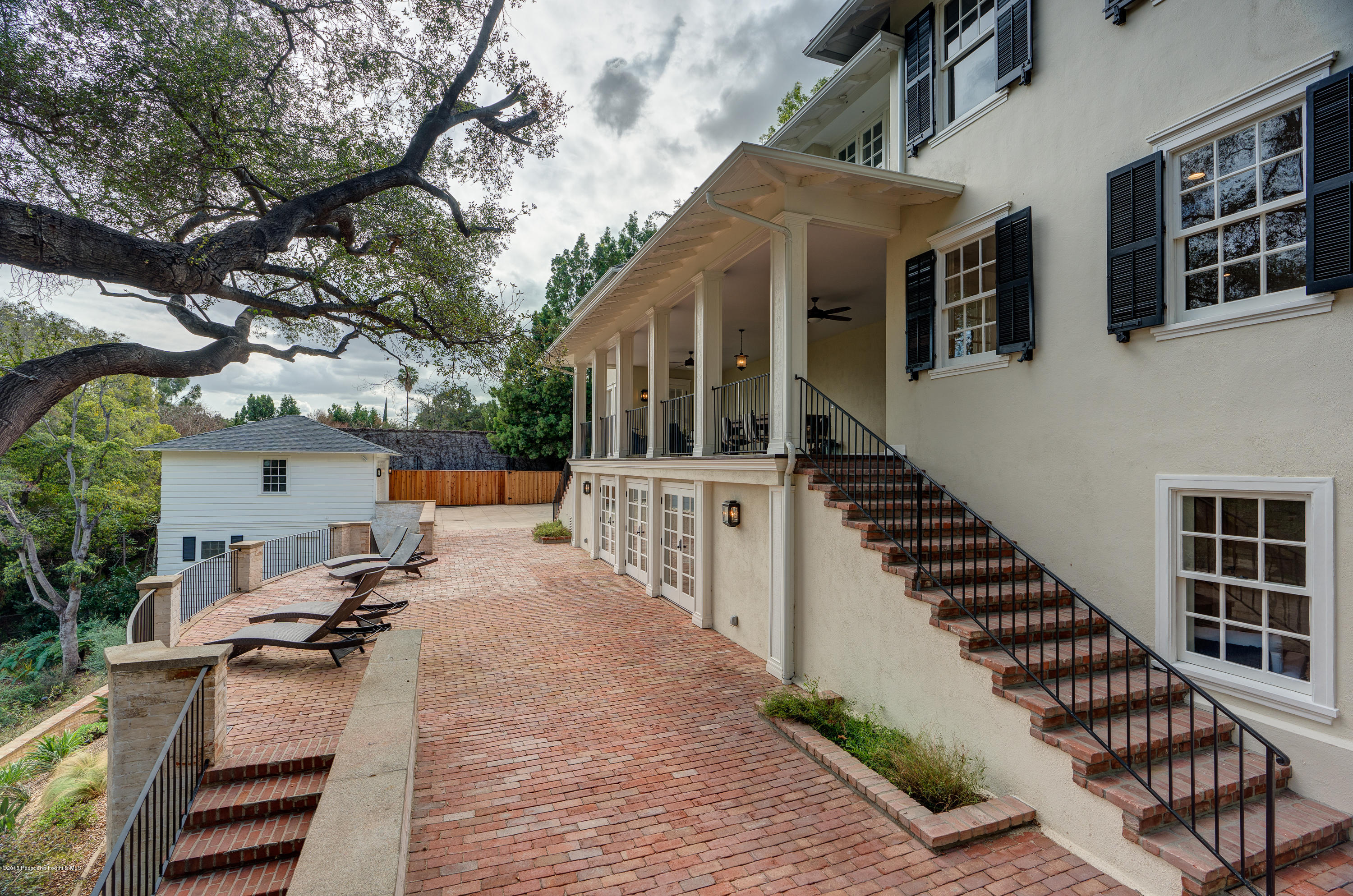 1234 Hillcrest Avenue Pasadena, CA 91106 - Photo 61 of 82 a view of a patio with wooden floor and fence