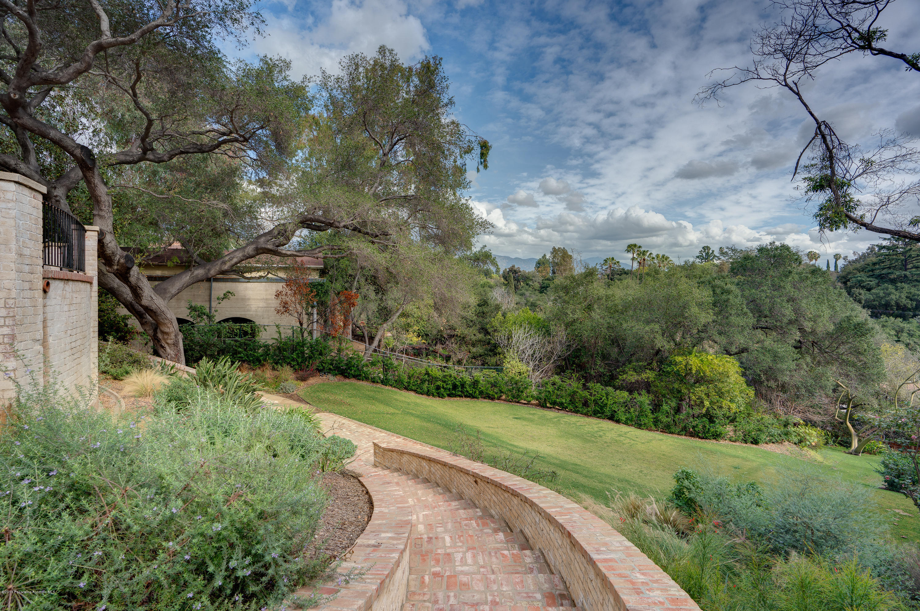 1234 Hillcrest Avenue Pasadena, CA 91106 - Photo 64 of 82 a view of a street with a building in the background