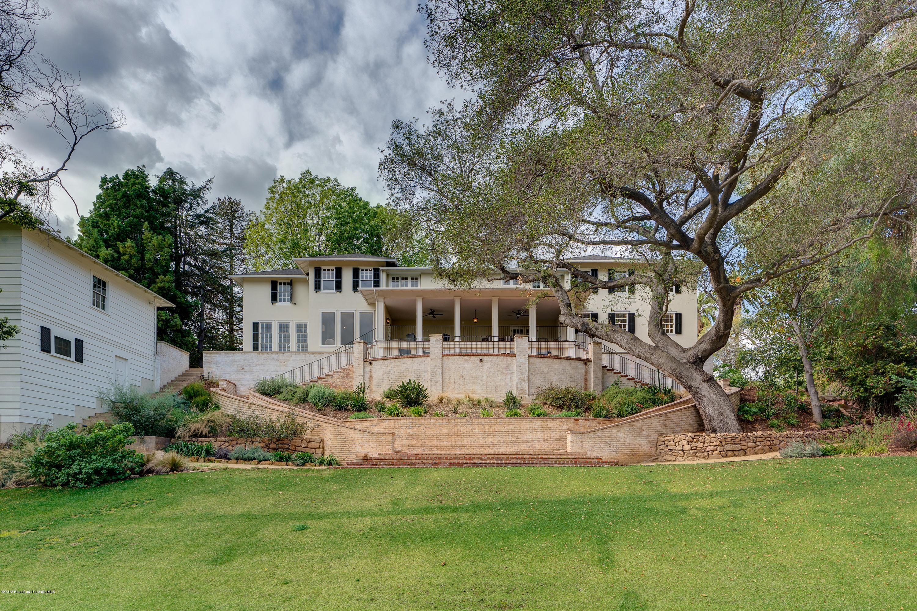 1234 Hillcrest Avenue Pasadena, CA 91106 - Photo 65 of 82 a view of a house with backyard and sitting area
