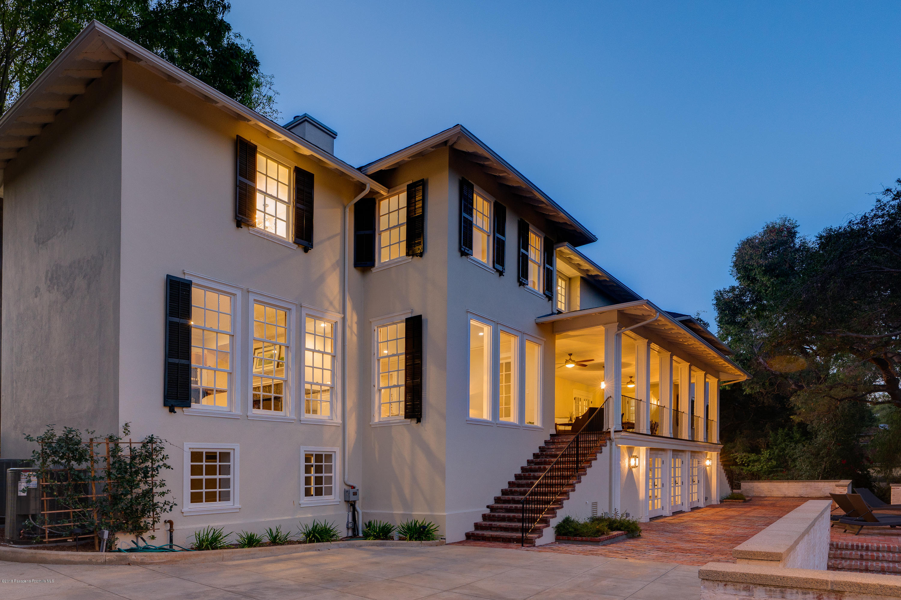 1234 Hillcrest Avenue Pasadena, CA 91106 - Photo 77 of 82 a front view of a house with a yard
