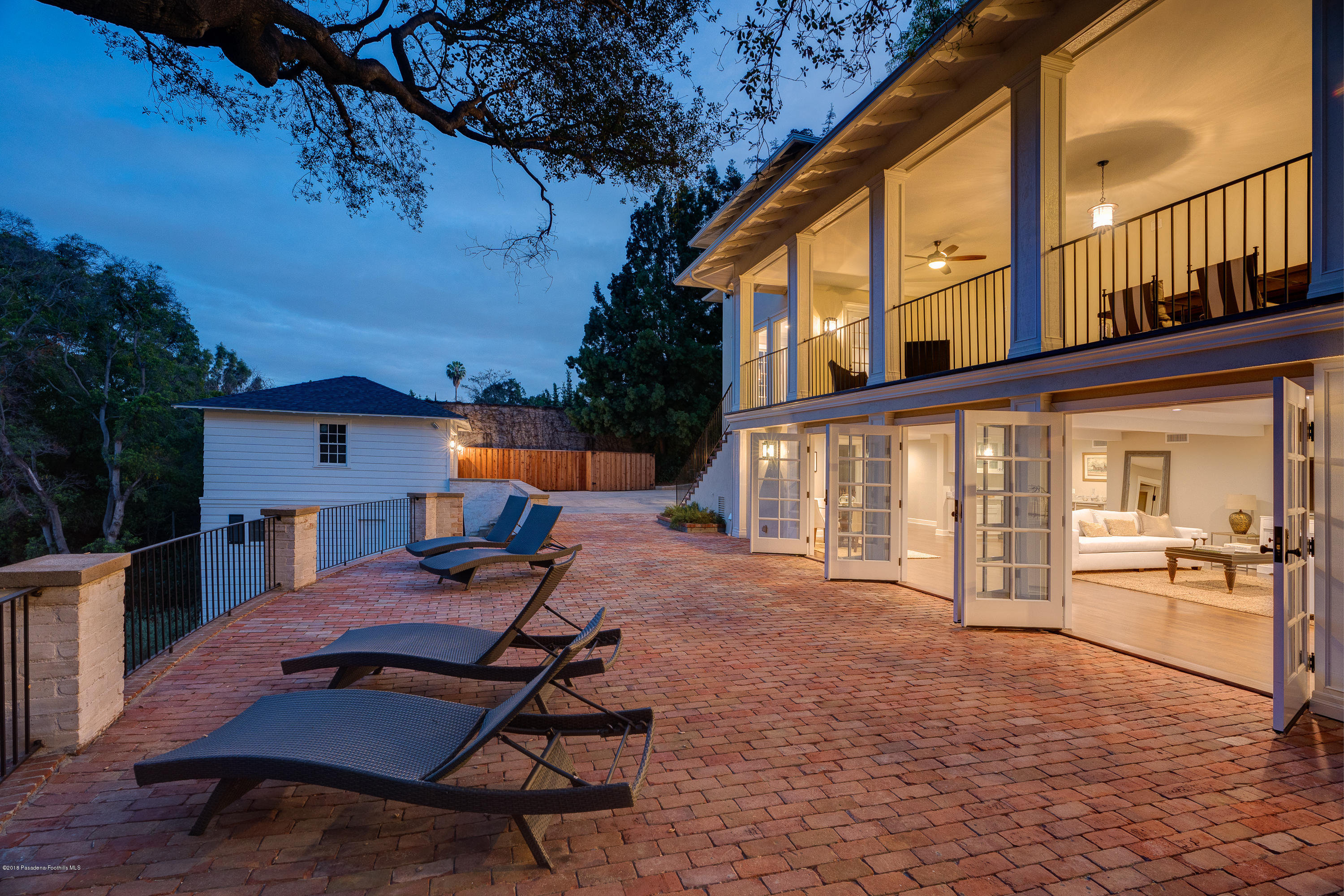 1234 Hillcrest Avenue Pasadena, CA 91106 - Photo 79 of 82 a backyard of a house with barbeque oven table and chairs