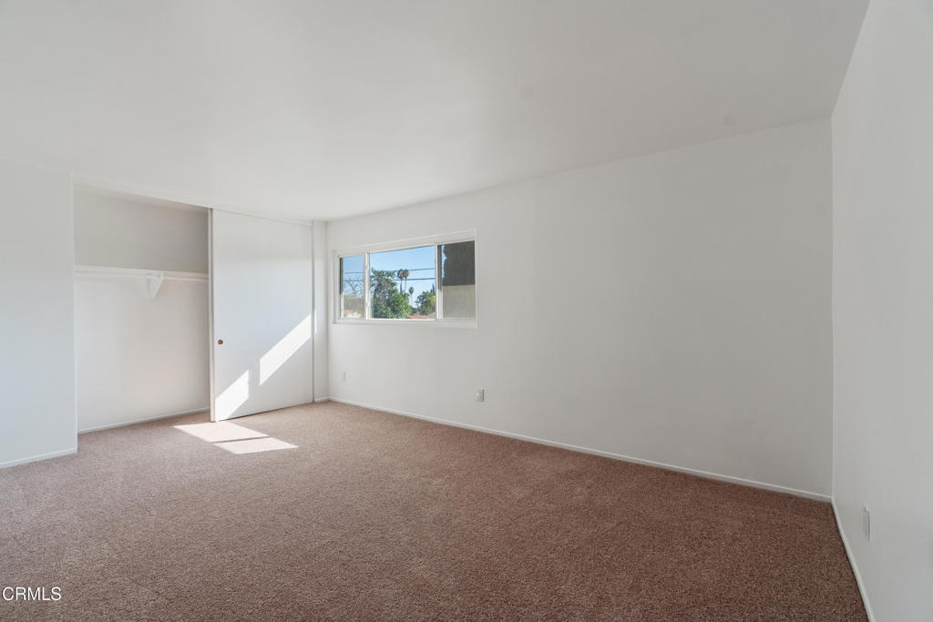 18719 Chase Street Northridge, CA 91324 - Photo 17 of 32 a view of an empty room with a window
