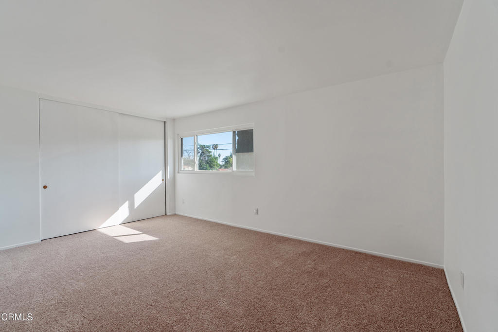 18719 Chase Street Northridge, CA 91324 - Photo 18 of 32 a view of an empty room with a window