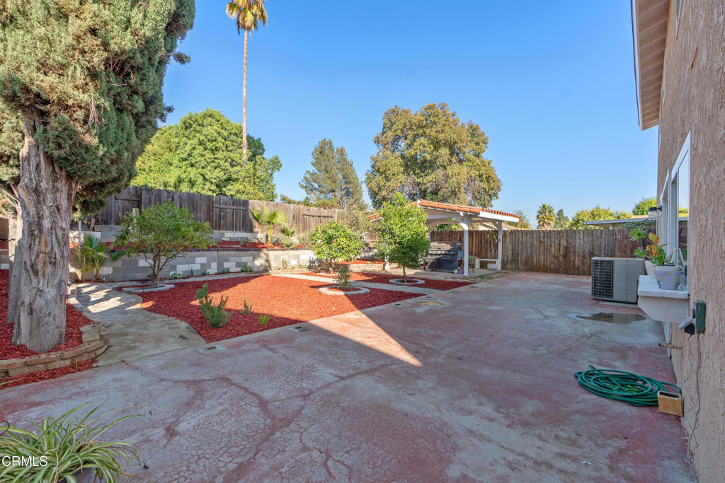 18719 Chase Street Northridge, CA 91324 - Photo 25 of 32 a view of a backyard