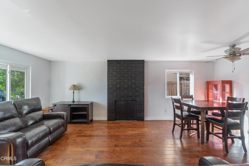 18719 Chase Street Northridge, CA 91324 - Photo 3 of 32 a living room with furniture and wooden floor