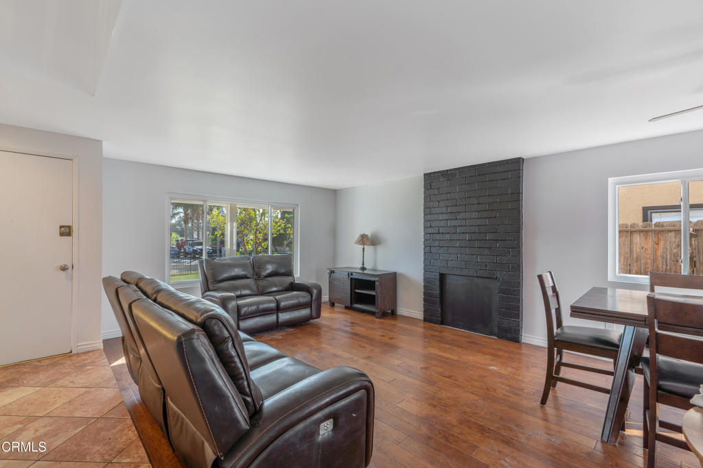 18719 Chase Street Northridge, CA 91324 - Photo 5 of 32 a view of a livingroom with furniture window and wooden floor