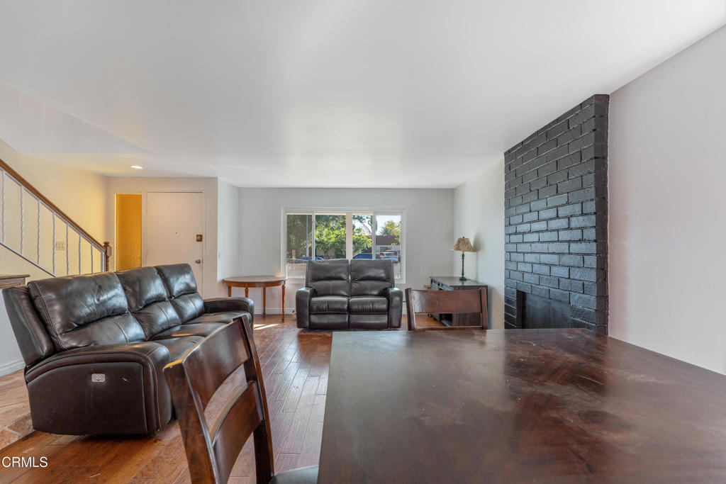 18719 Chase Street Northridge, CA 91324 - Photo 7 of 32 a living room with furniture and a couch