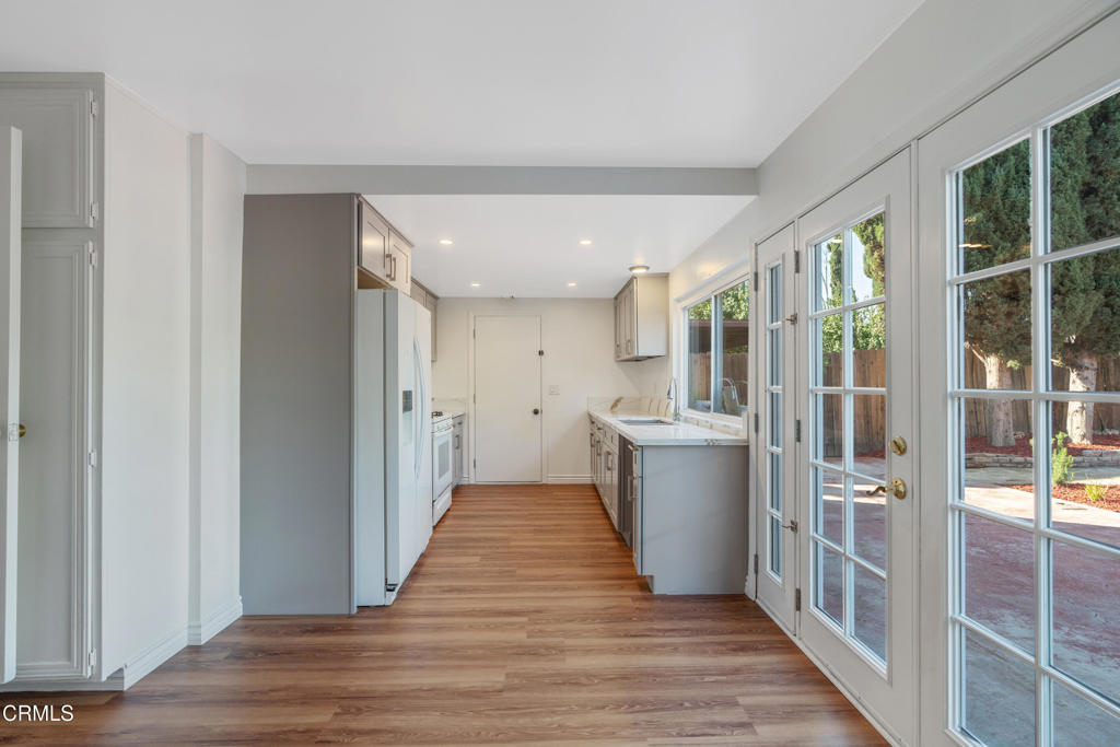18719 Chase Street Northridge, CA 91324 - Photo 10 of 32 a view of a kitchen with a sink and cabinets