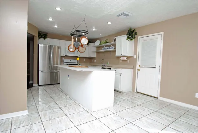 $335,000 | 6022 South Trafalgar Court, Katy, TX 77449