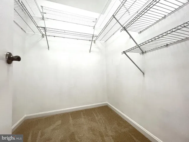 a view of a room with racks on the wall