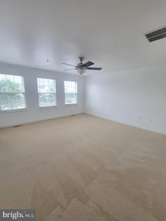 a bathroom with a sink a bathtub and a mirror