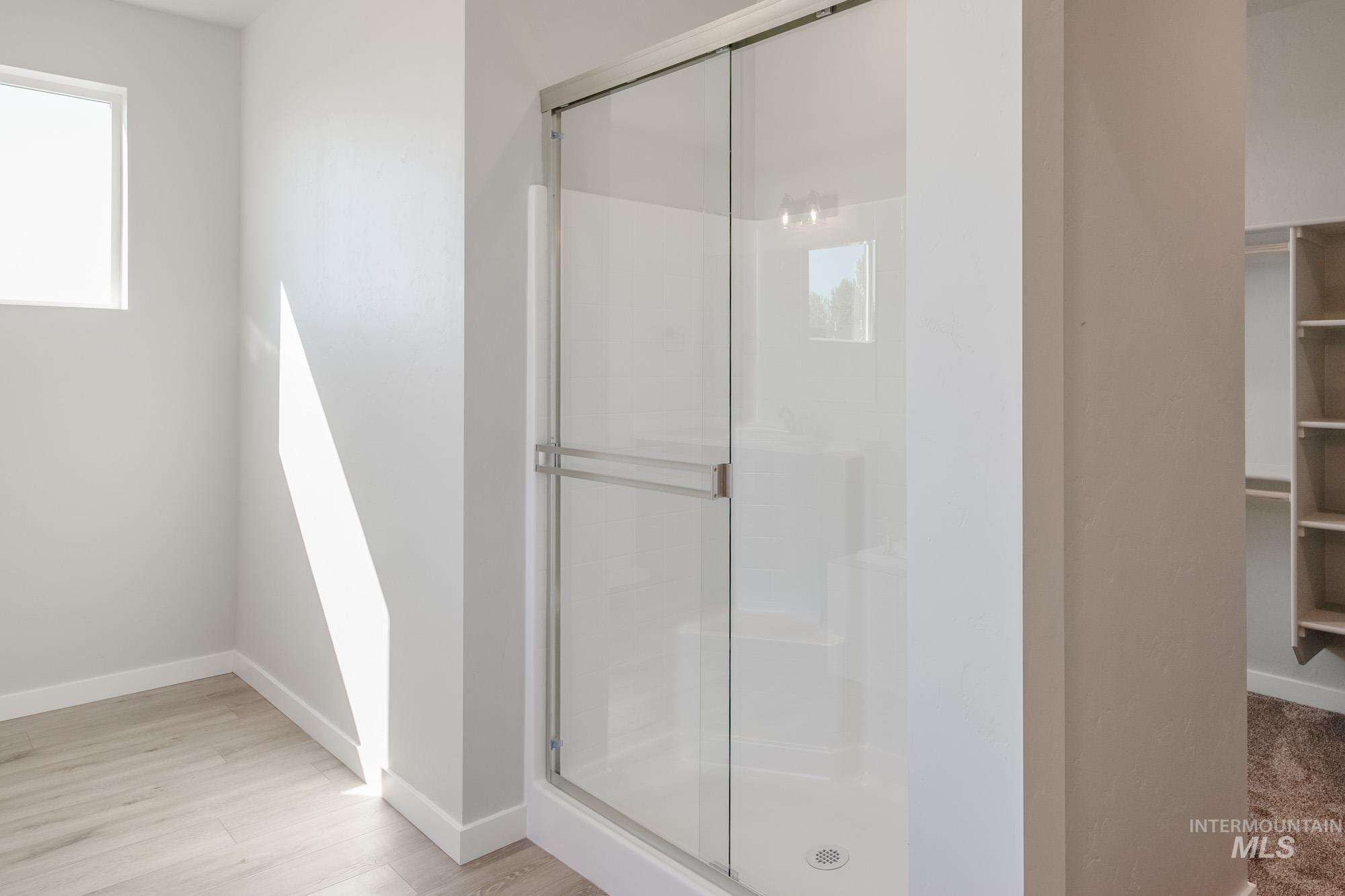 13708 Judson Street Caldwell, ID 83607 - Photo 29 of 32 Full bath with a stall shower and a spacious closet