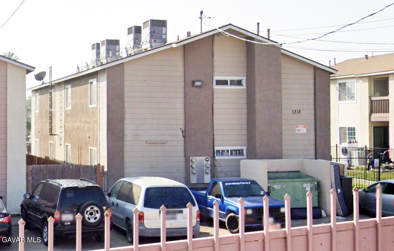 1312 Flower Street Bakersfield, CA 93305 - Photo 5 of 5 a front view of a building with glass windows