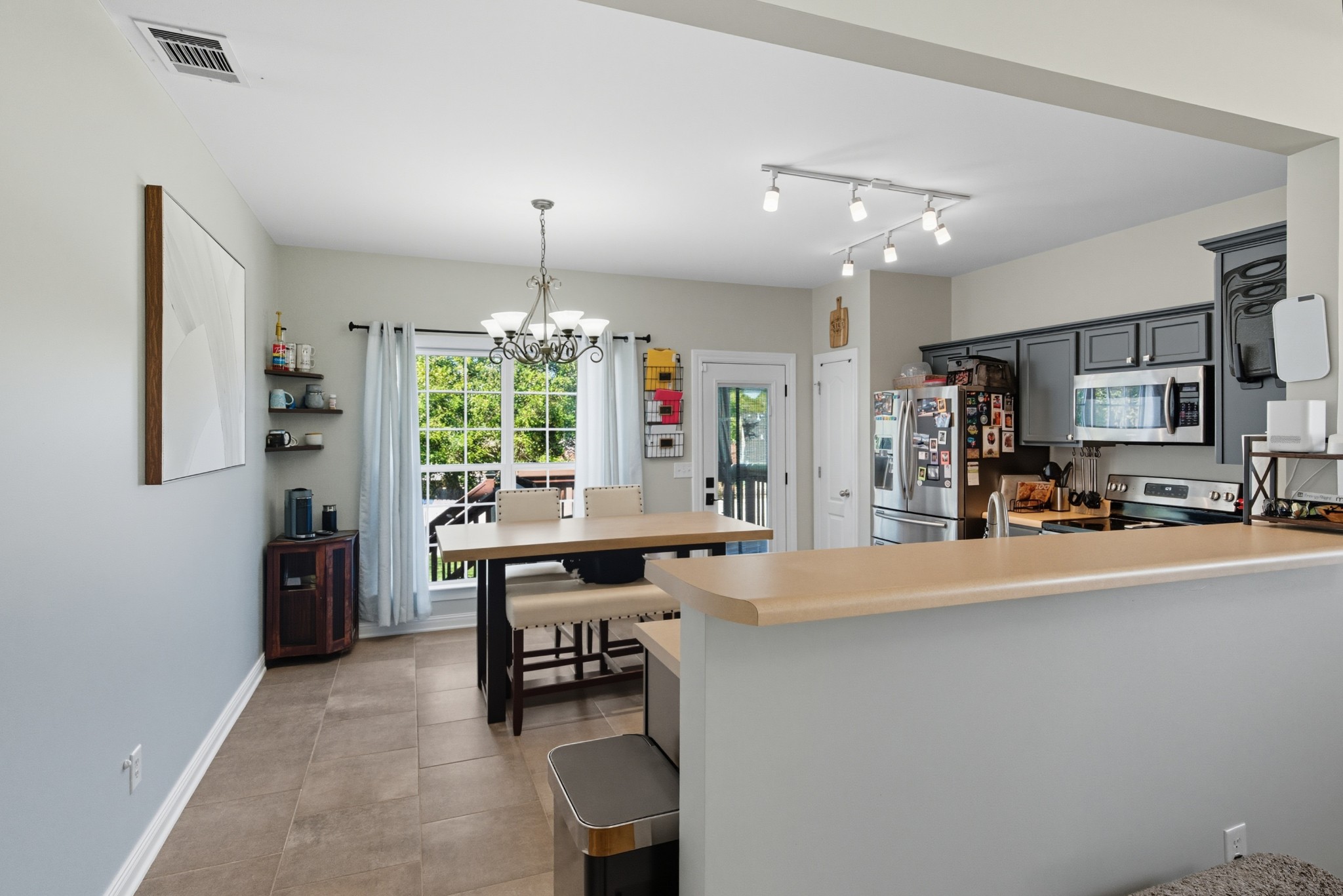 1511 Saddle View Mount Juliet, TN 37122 - Photo 14 of 52 a view of a dining room with furniture window and outside view