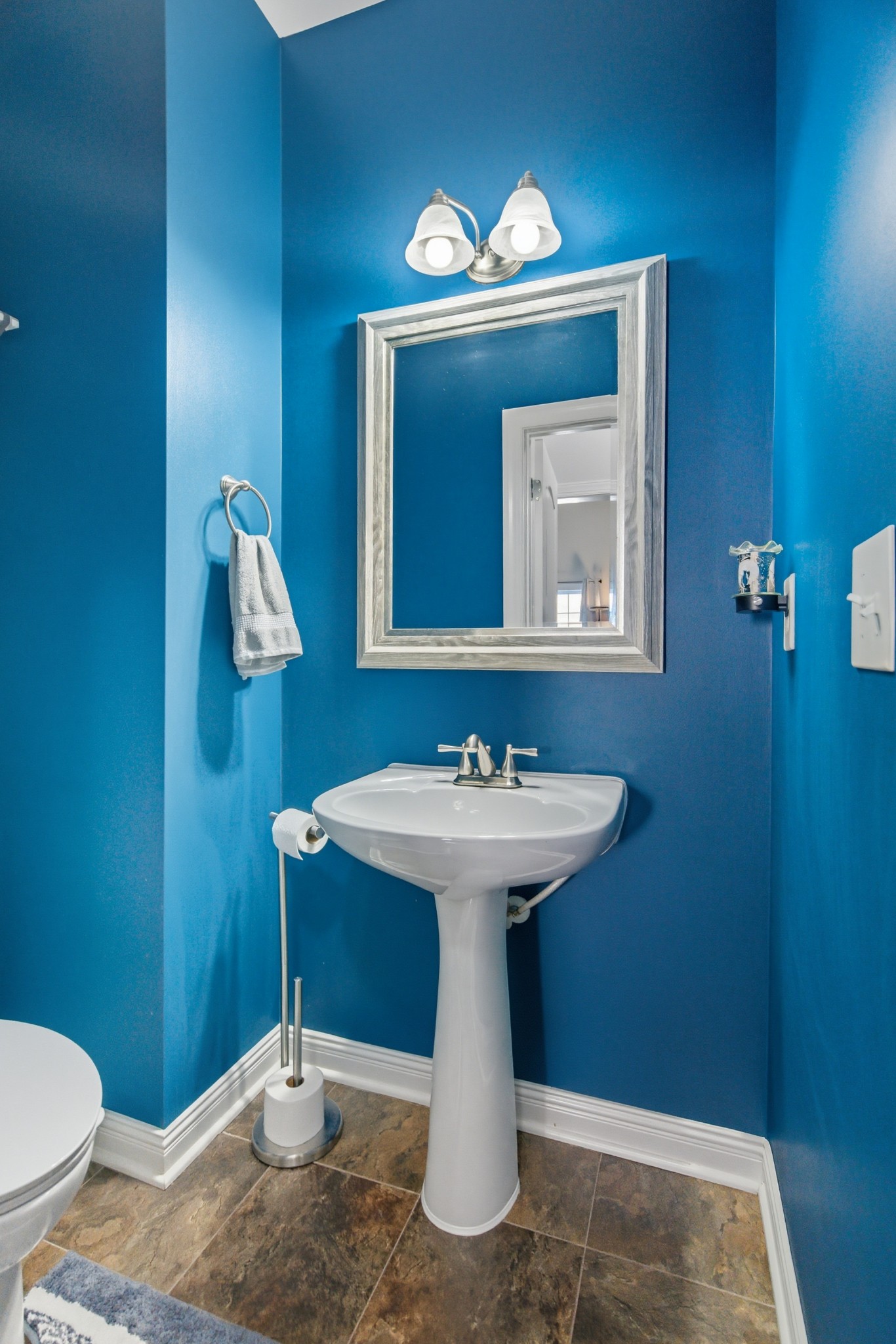 1511 Saddle View Mount Juliet, TN 37122 - Photo 15 of 52 a bathroom with a sink a toilet and mirror