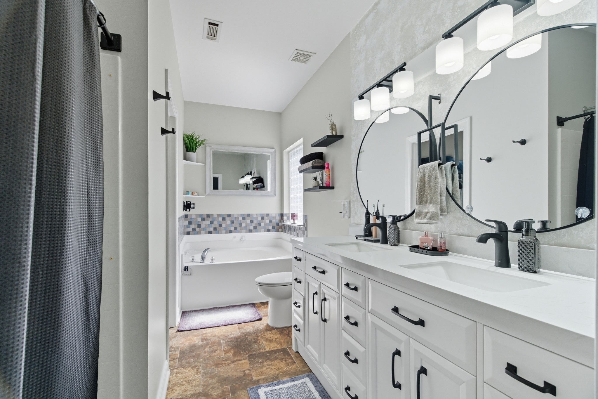 1511 Saddle View Mount Juliet, TN 37122 - Photo 18 of 52 a bathroom with double vanity sink and a mirror