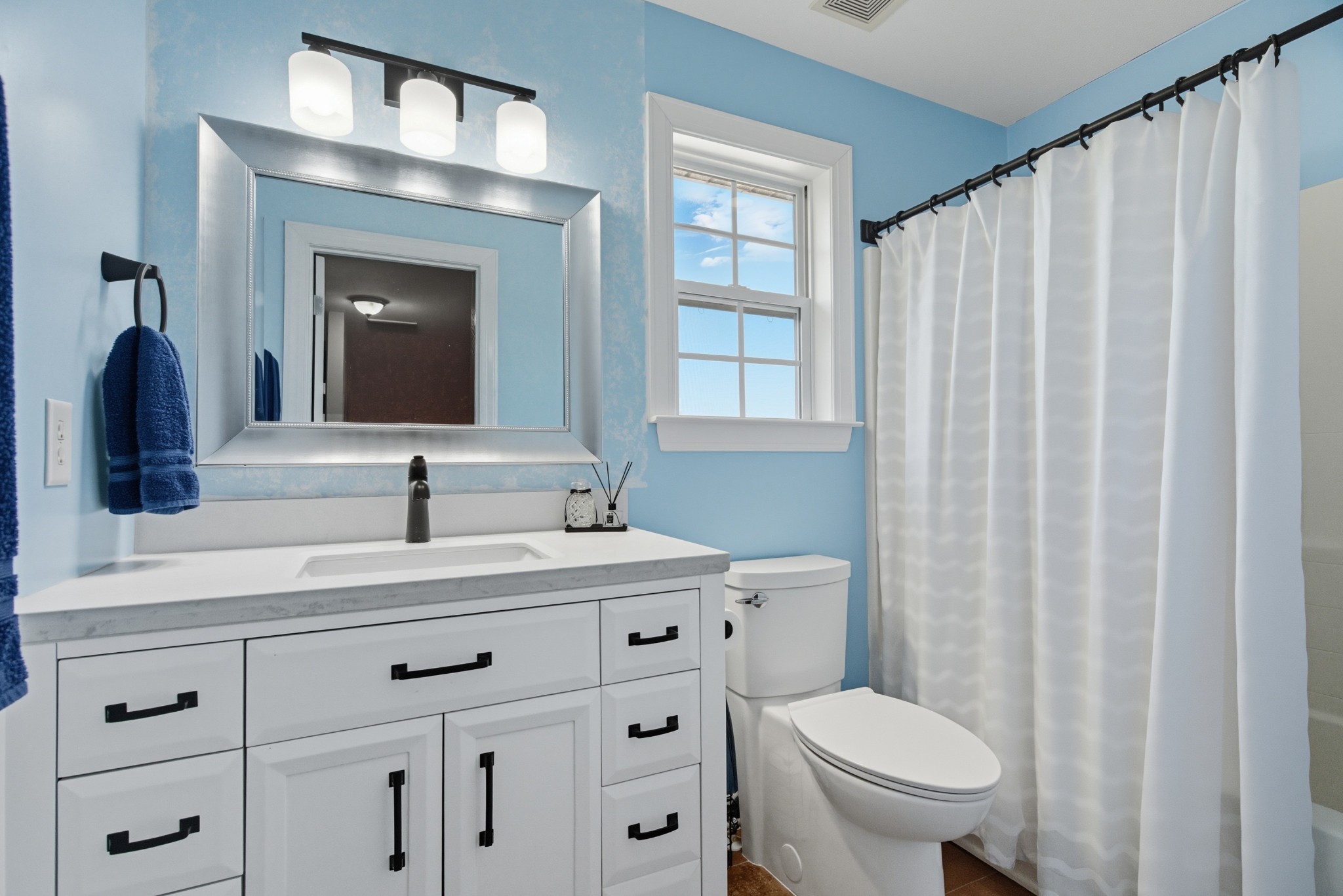 1511 Saddle View Mount Juliet, TN 37122 - Photo 26 of 52 a bathroom with a toilet a sink and mirror