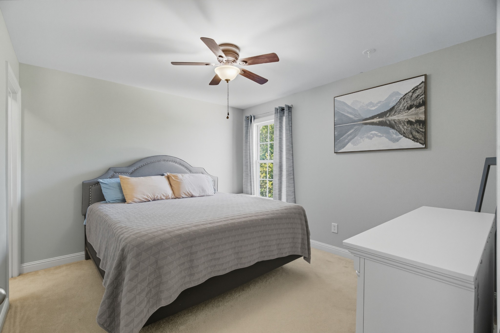 1511 Saddle View Mount Juliet, TN 37122 - Photo 27 of 52 a bedroom with a bed and a chandelier