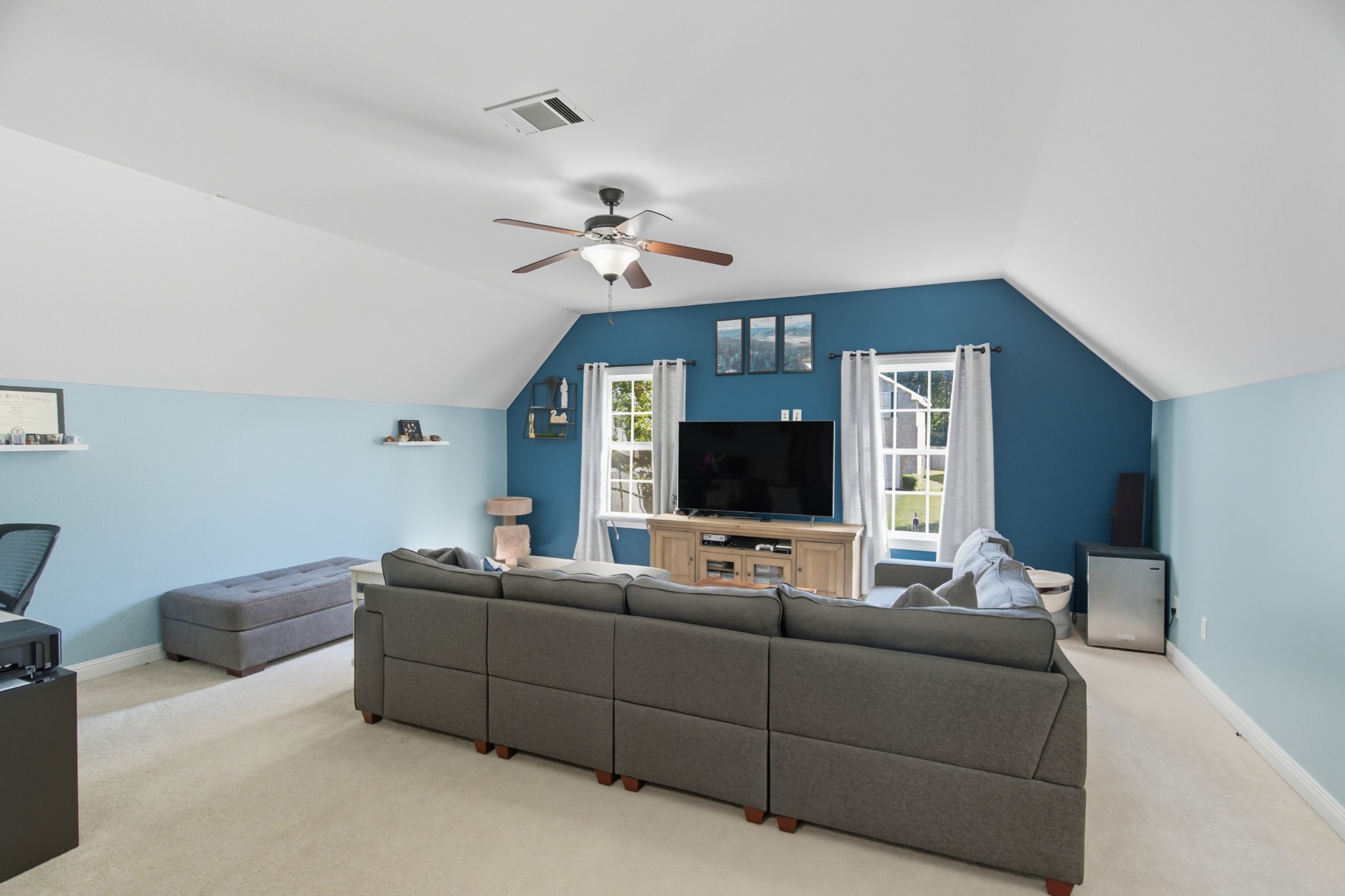 1511 Saddle View Mount Juliet, TN 37122 - Photo 29 of 52 a living room with furniture and a flat screen tv