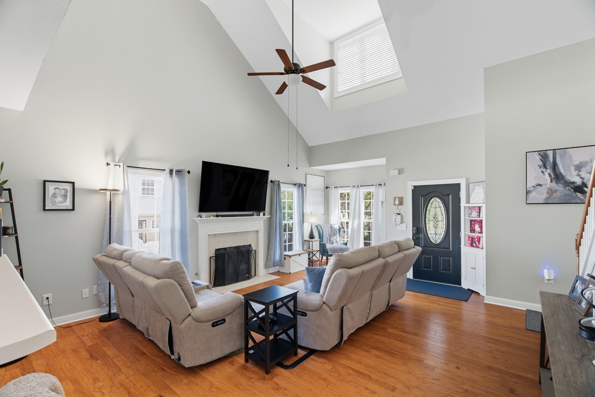 1511 Saddle View Mount Juliet, TN 37122 - Photo 4 of 52 a living room with furniture fireplace and a flat screen tv