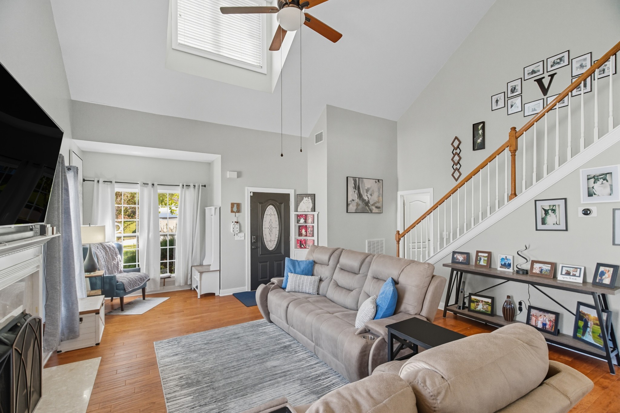 1511 Saddle View Mount Juliet, TN 37122 - Photo 8 of 52 a living room with furniture and a flat screen tv