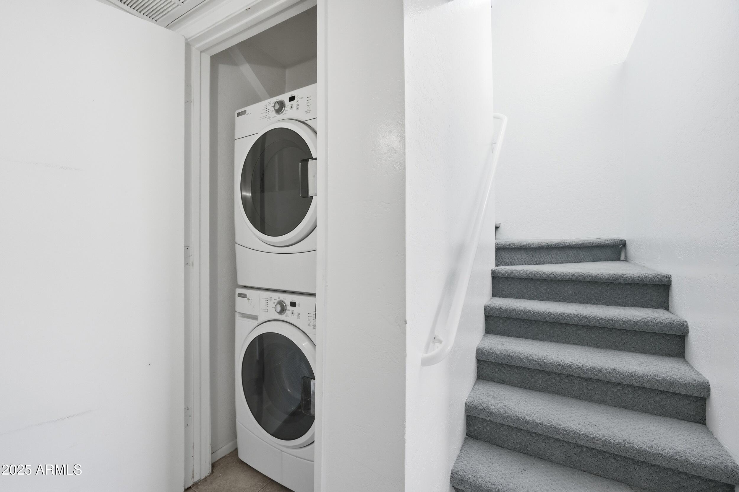 3845 East Greenway Road, Unit 230 Phoenix, AZ 85032 - Photo 11 of 37 a utility room with dryer and washer