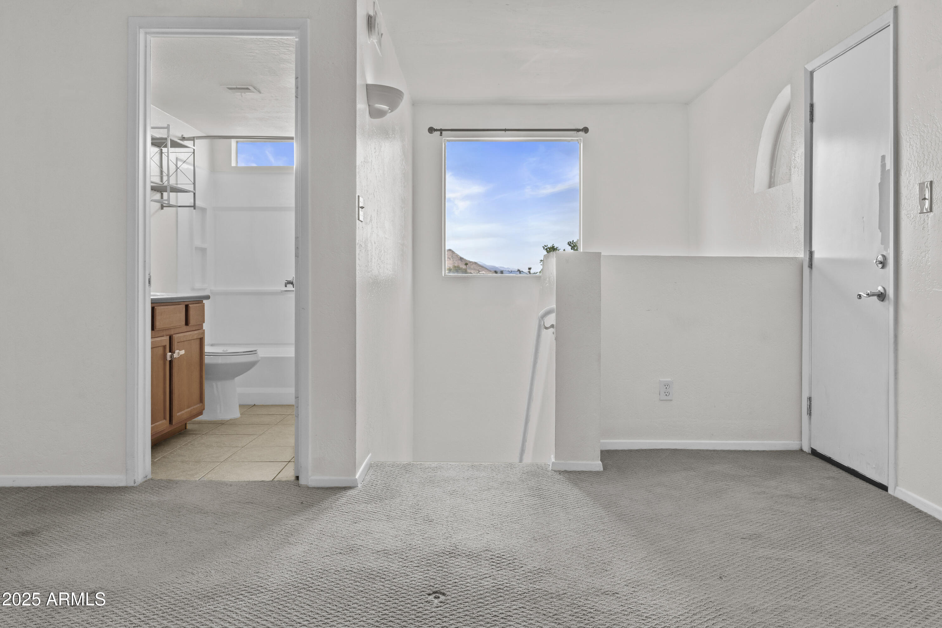 3845 East Greenway Road, Unit 230 Phoenix, AZ 85032 - Photo 14 of 37 a view of an empty room