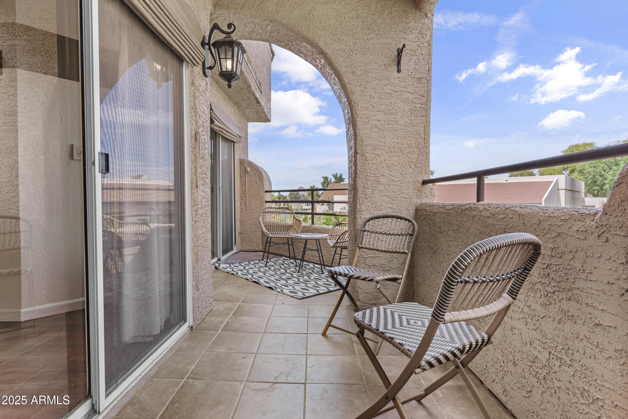 3845 East Greenway Road, Unit 230 Phoenix, AZ 85032 - Photo 20 of 37 a view of balcony with furniture