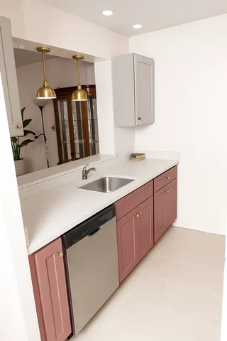 a bathroom with a sink double vanity and a mirror