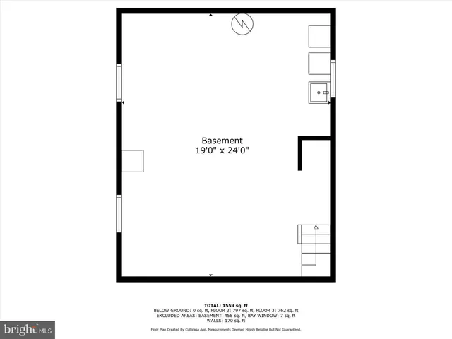 a picture of a bench in front of a wall