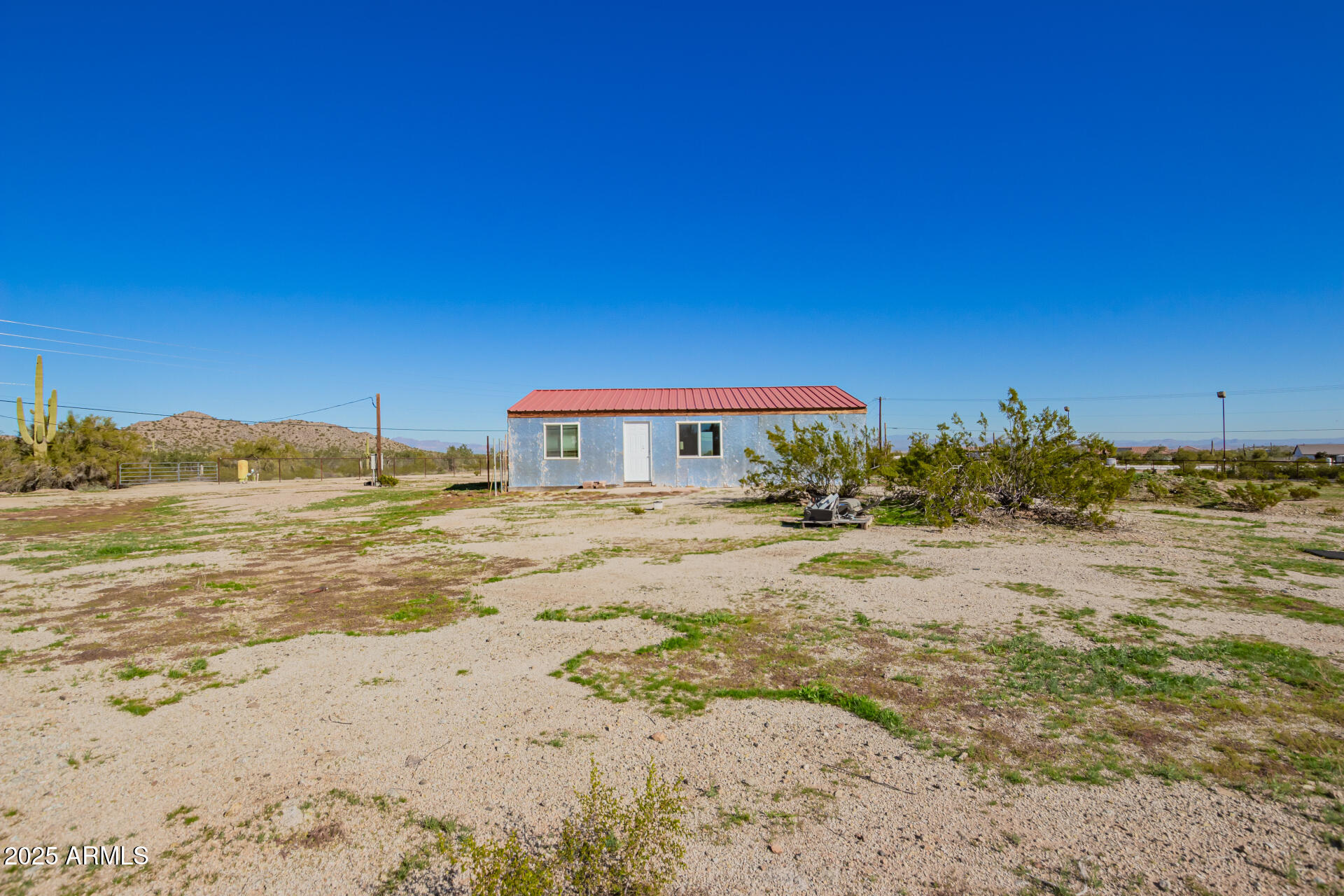 29042 North Brenner Pass Road San Tan Valley, AZ 85144 - Photo 14 of 24 a house with a beach