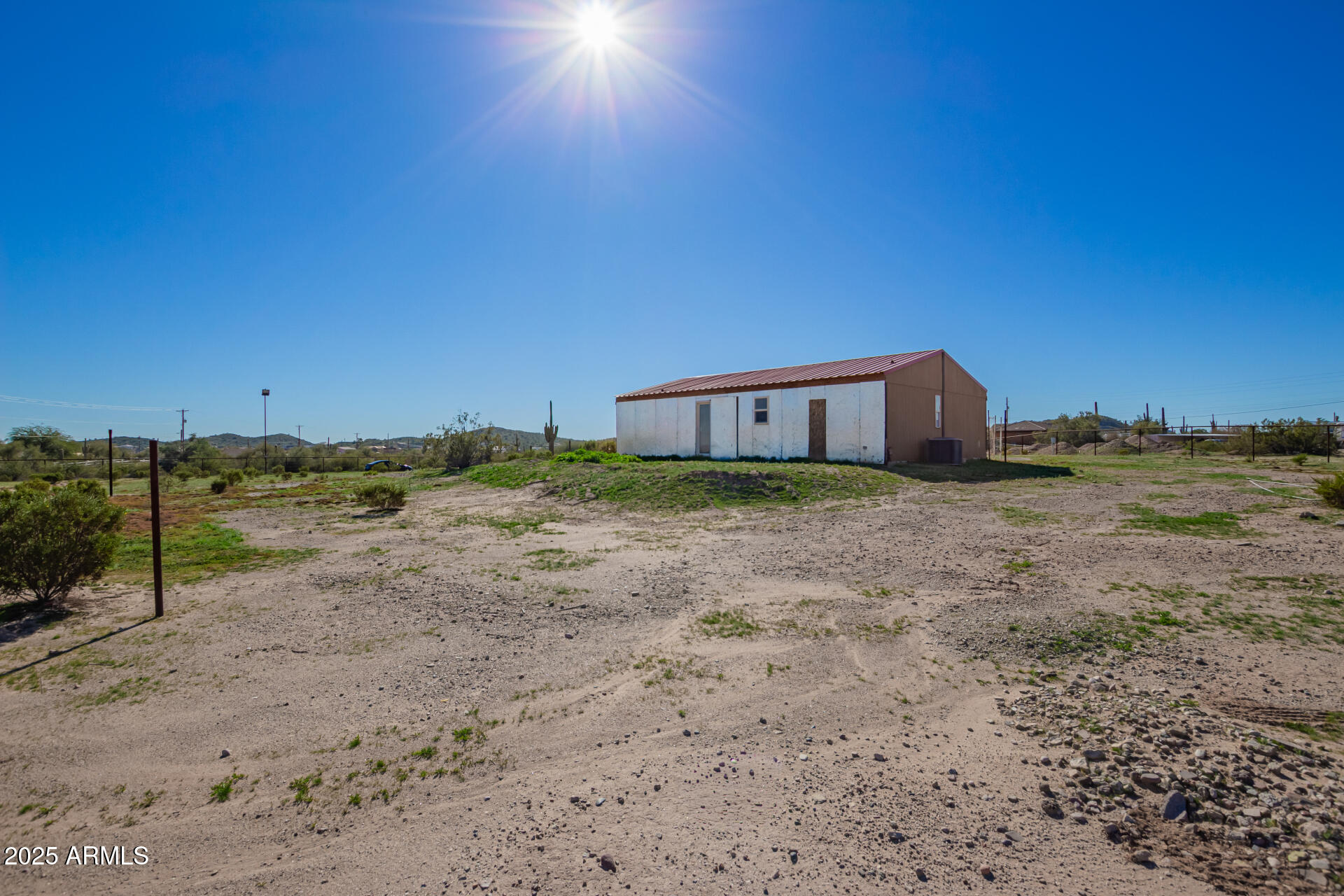 29042 North Brenner Pass Road San Tan Valley, AZ 85144 - Photo 9 of 24 a view of a house with a yard