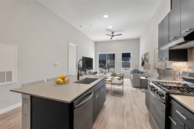 a bedroom with a bed and a fireplace