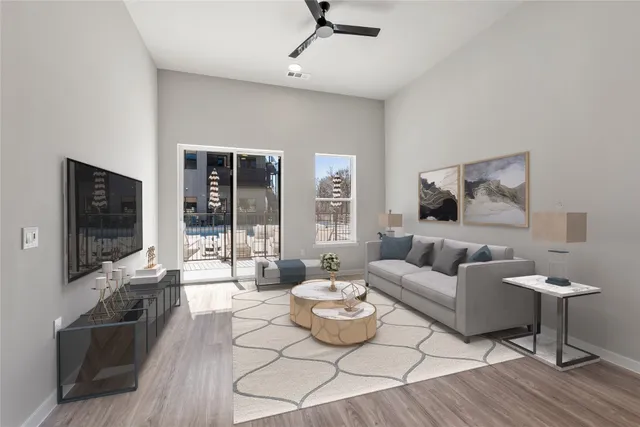 a kitchen with a sink a counter space appliances and cabinets