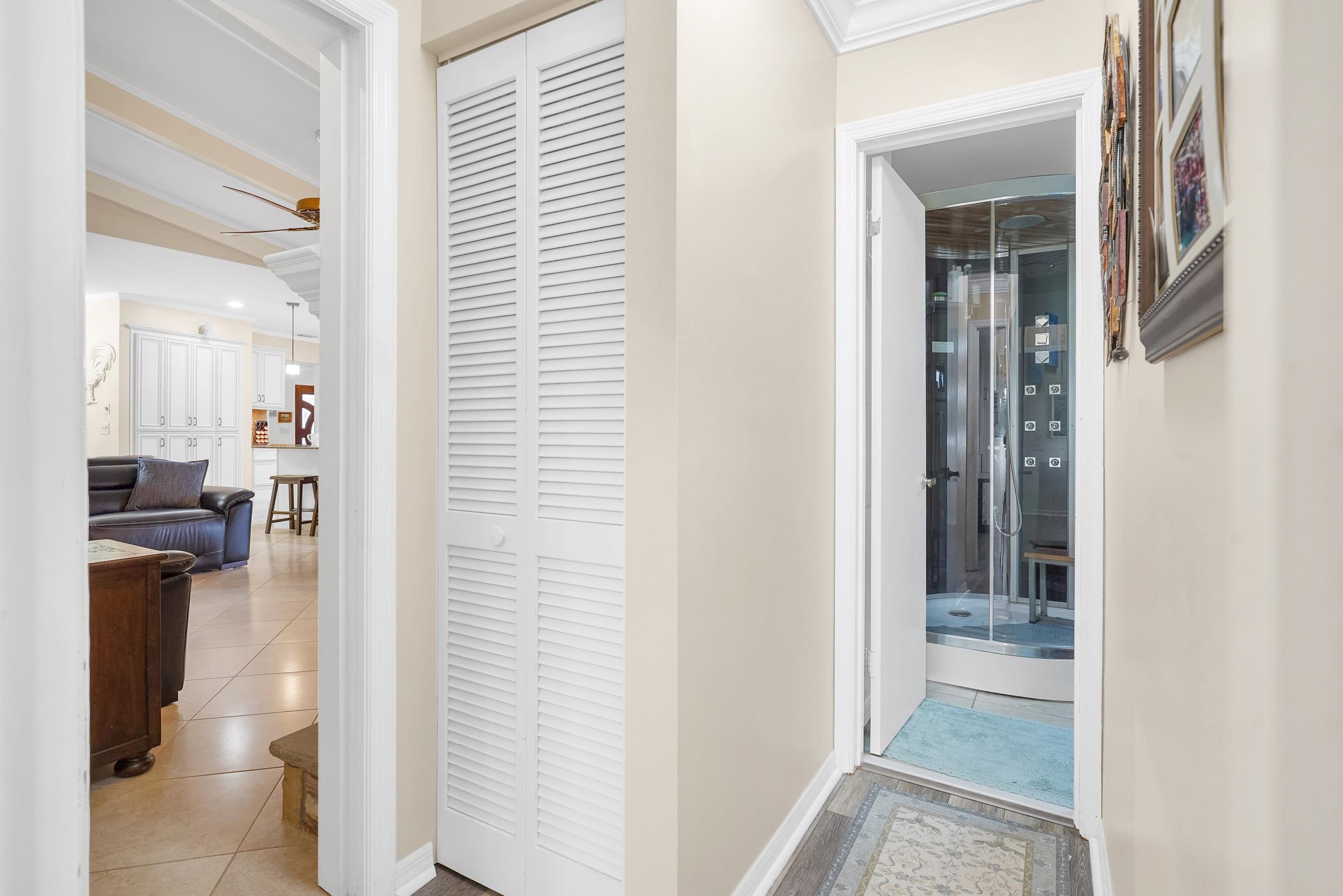 4 Calusa Court Palm Coast, FL 32137 - Photo 29 of 51 Corridor featuring tile patterned floors and baseboards