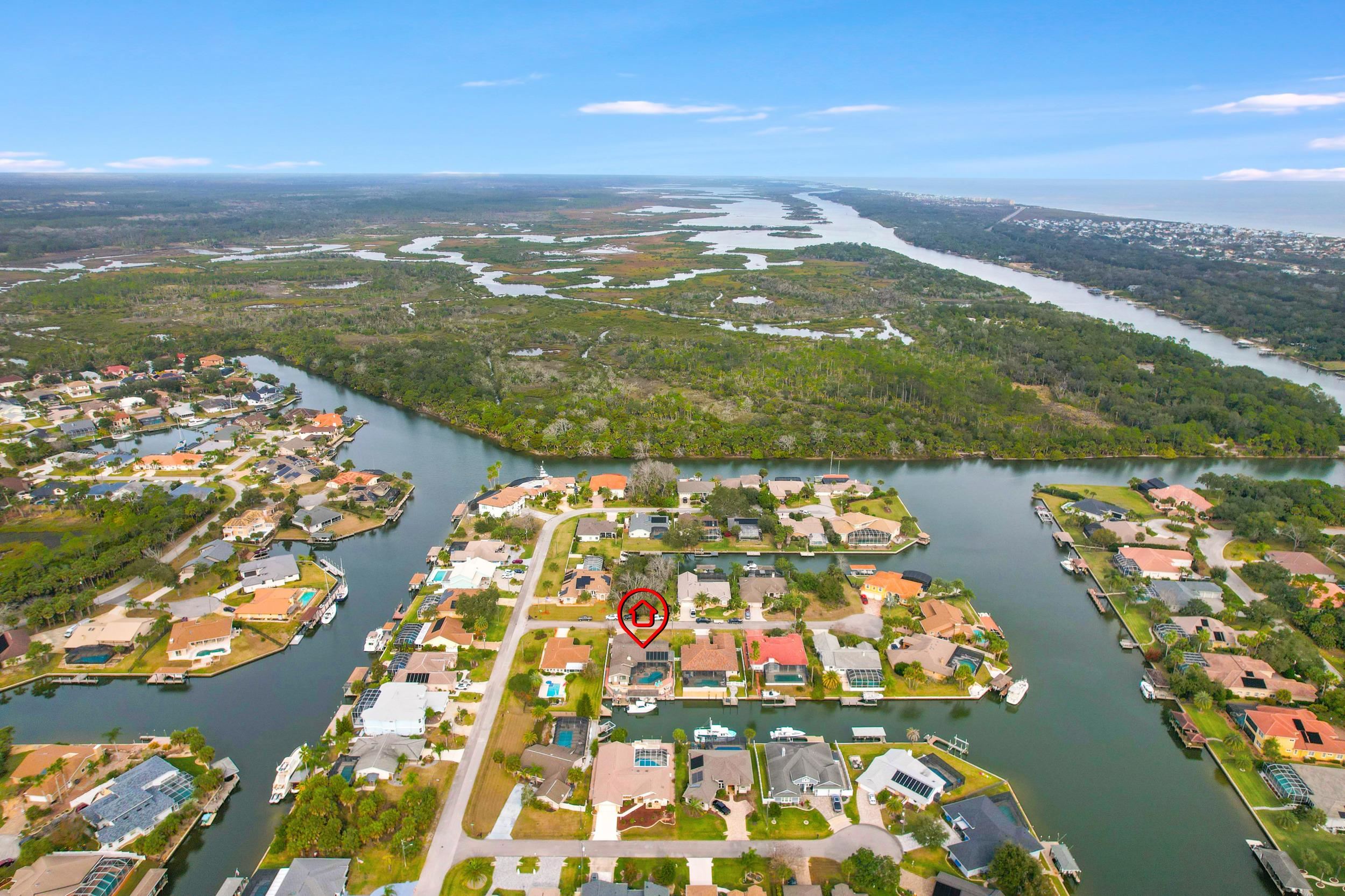 4 Calusa Court Palm Coast, FL 32137 - Photo 47 of 51 Aerial overview of property's location with a large body of water