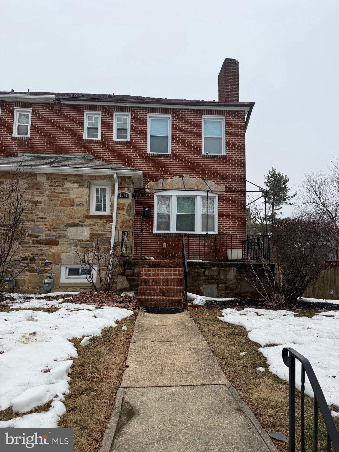 4814 Coleherne Road Baltimore, MD 21229 - Photo 8 of 8 a front view of a house with a yard