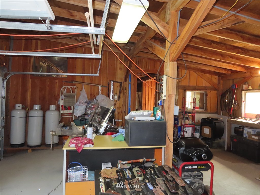 287 Mule Deer Road Republic, WA 99166 - Photo 19 of 25 a room with storage and utility