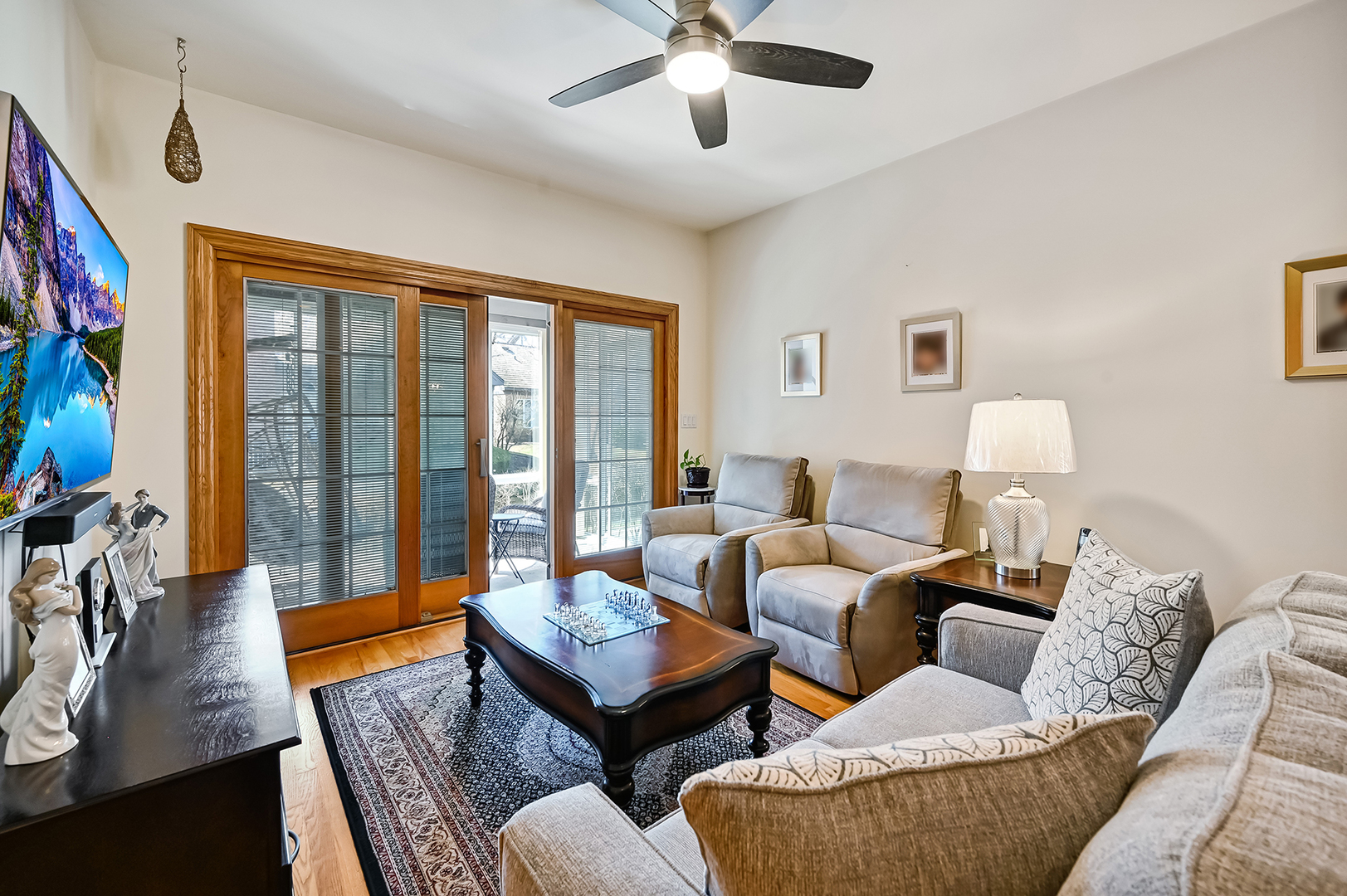 61 Berkshire Court Burr Ridge, IL 60527 - Photo 14 of 47 a living room with furniture and a large window